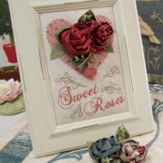 Sweet Roses ~ Brooch in frame and blue brooch below