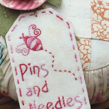 Roses and Ruching  embroidered tag